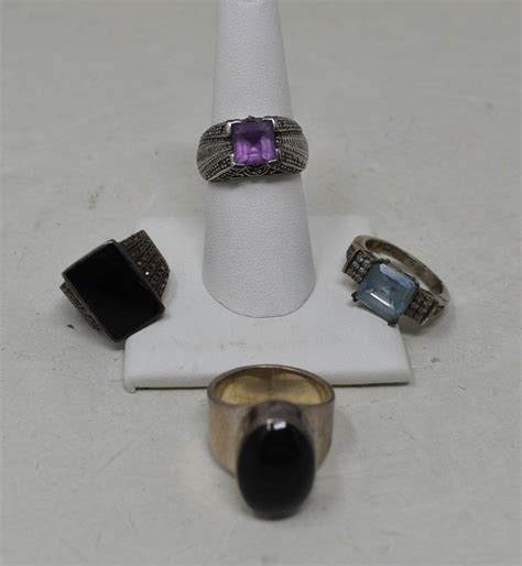 4 Sterling Silver Rings Auction