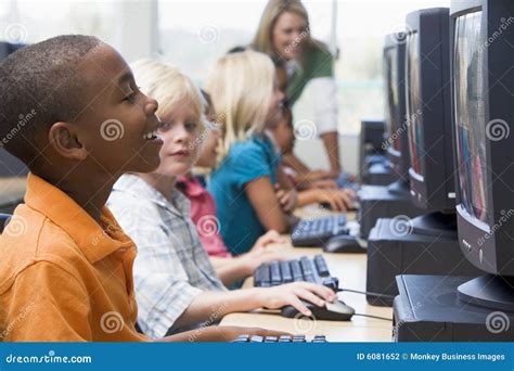 Kindergarten Children Learning To Use Computers Stock Photo Image Of