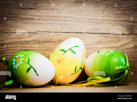 Easter Eggs And Pussy Willow On Rustic Wooden Background Stock Photo Alamy