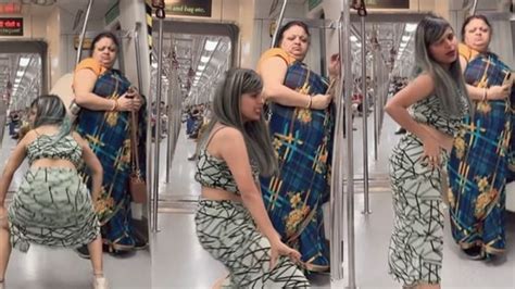 Womans Obscene Dance In Delhi Metro Irks Aunty Standing Behind Her