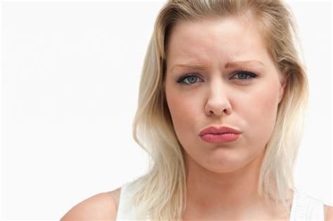 Premium Photo Upset Blonde Woman Staring At The Camera