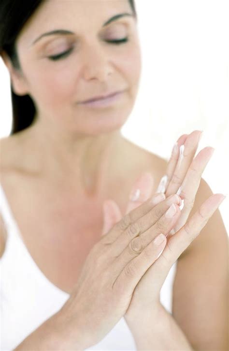 Woman Applying Hand Cream Photograph By Ian Hootonscience Photo Library Pixels