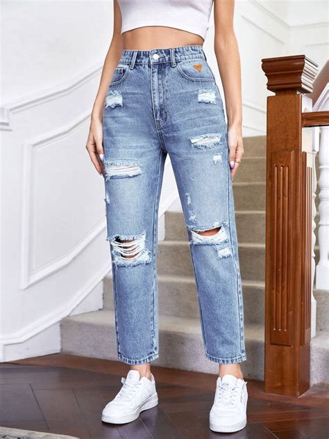 Calça jeans reta Cintura alta Detalhe Remendo Rasgado Pano Calça