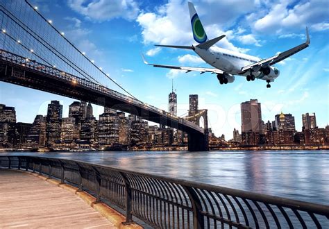 Aircraft Overflying New York City Skyline Stock Image Colourbox