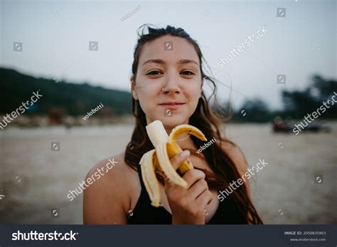 Portrait Brunette Girl Eating Banana On Stock Photo 2050835903 Shutterstock