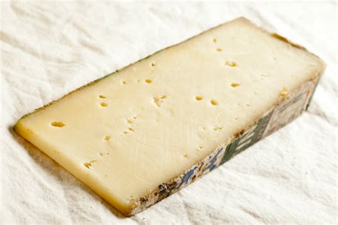 Why does Swiss cheese have holes?