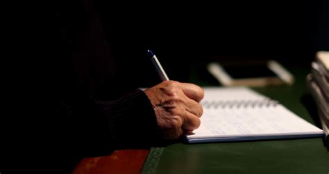 Pensive Older Woman Writing Notes Sitting At Stock Footage Sbv