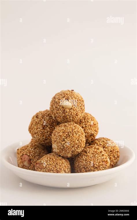 Indian Winter Delicacy White Ball Shaped Tilgul Laddu Or Safed Til Ki