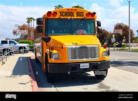 Los Angeles, California: School Bus parked on the street Stock Photo ...