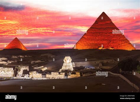 Illuminated Pyramids of Egypt and the great Sphinx night view, Giza ...