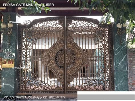 an ornate iron gate in front of a building