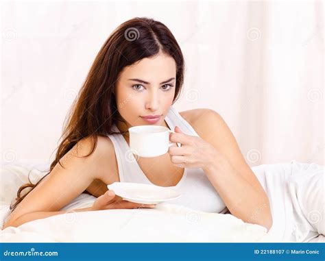 Woman Holding Cup Of Coffee In Bed Stock Image Image Of Girl