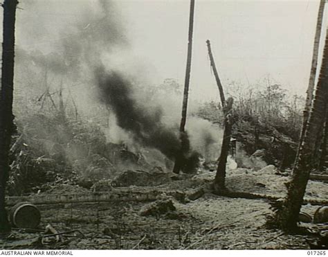 Dutch New Guinea A Burning Japanese Dump On The Beach At Biak Island