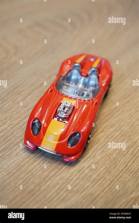 A Vertical High Angle Shot Of A Mattel Hot Wheels Toy Model Glory Chaser Red Race Car On A