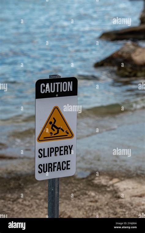 Caution Slippery Surface Warning Sign Stock Photo Alamy