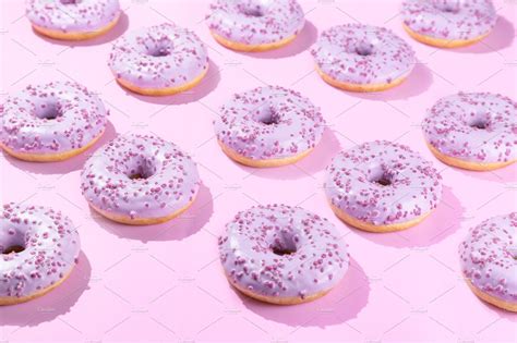 Pimk Donuts On Pink Background Containing Donut Background And Glazed