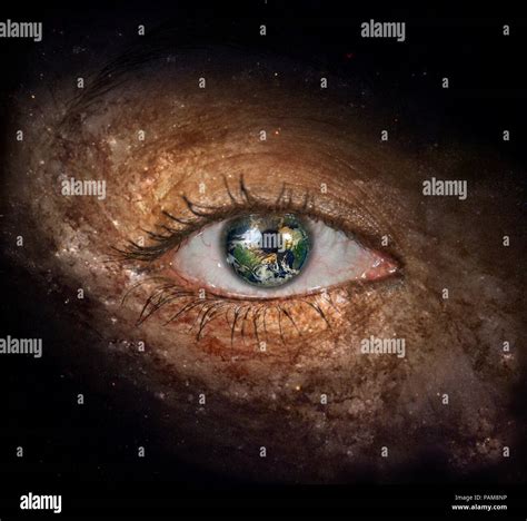 Surrealism. Woman's eye with galaxies. Planet Earth Iris Stock Photo - Alamy