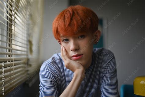 Portrait With Asian Gay Teenage LGBT Boy Looking At The Camera With