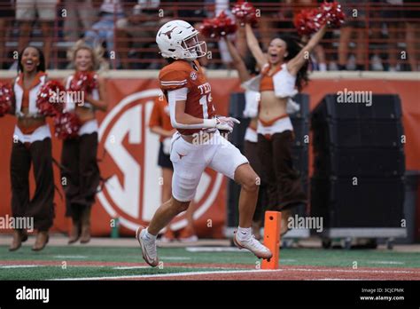 Texas wide receiver Parker Livingstone (13) scores a touchdown against
