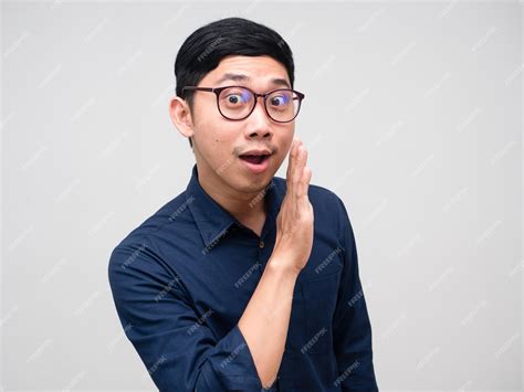 Premium Photo | Young businessman gesture whisper isolated