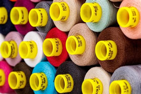 Premium Photo Set Of Multicolored Spools Of Thread For Sewing