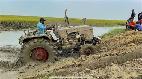 Eicher Tractor Stuck In Mud Over Tractor Loaded In Mud Tractor