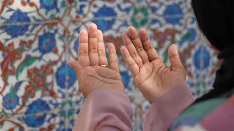 Muslim young woman in hijab is praying in mosque. 34860143 Stock Video ...