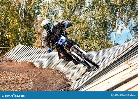 Downhill mountain biking stock photo. Image of competition - 142143576