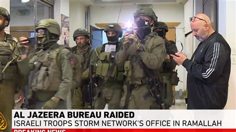 Heavily Armed Israeli Troops Raid And Close Down Al Jazeera S West Bank