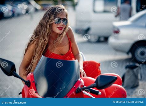 Fashion Model On Motorcycle Royalty Free Stock Image - Image: 6653466