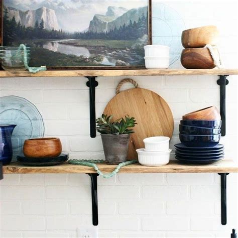 Open Kitchen Shelves With Reclaimed Wood And A Brick Backsplash My