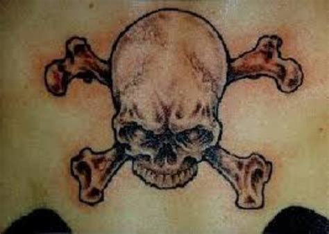 Skull Crossbone Tattoos And Meanings Skull Crossbone Tattoo Ideas And Designs Hubpages