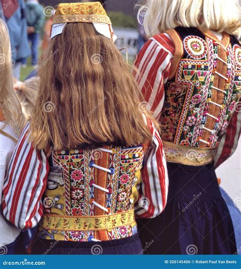Two Girls in Traditional Costume at Marken, Holland Editorial Photo