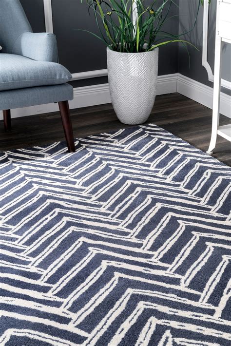 This 100 Wool And Hand Tufted Rug Is Both Fun And Functional And Adds