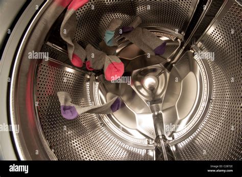 socks in the washing machine Stock Photo - Alamy