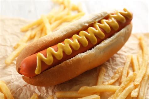 Hot Dogs And Fried Potatoes Stock Photo By ©belchonock 100925832