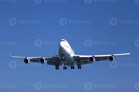 Jumbo jet landing 22772073 Stock Photo at Vecteezy