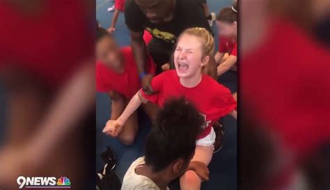 Videos Show High School Cheerleaders Forced Into Splits