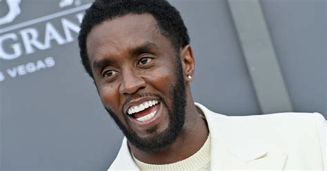 Diddy Shares First Picture Of Baby Love At Christmas Celebration