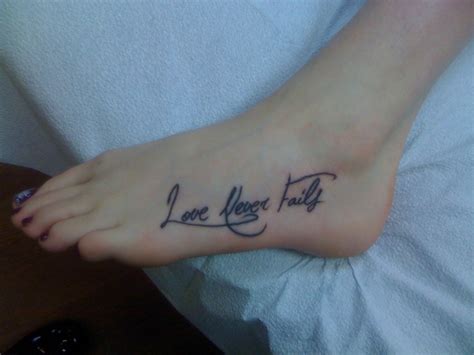 my first tattoo, god love is never failing