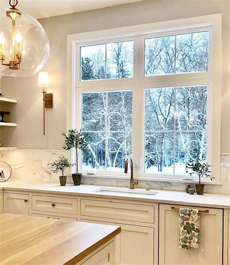 White Casement Windows Brighten Farmhouse Style Kitchen