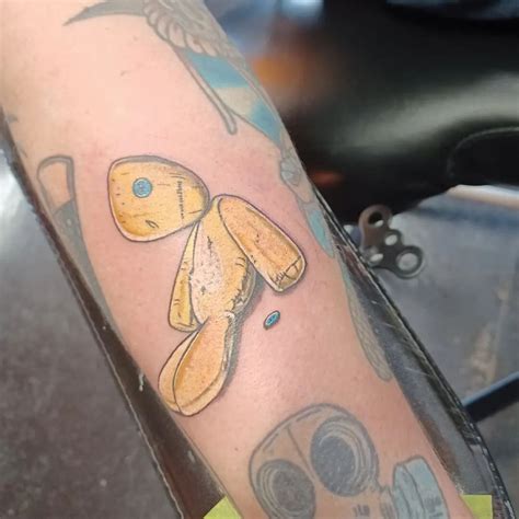 Korn Issues Doll Tattoo