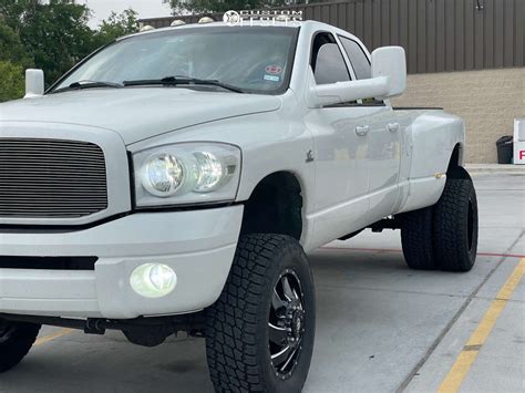 2007 Dodge Ram 3500 with 20x10 -24 Fuel Cleaver and 35/12.5R20 Nitto Terra Grappler G2 and ...