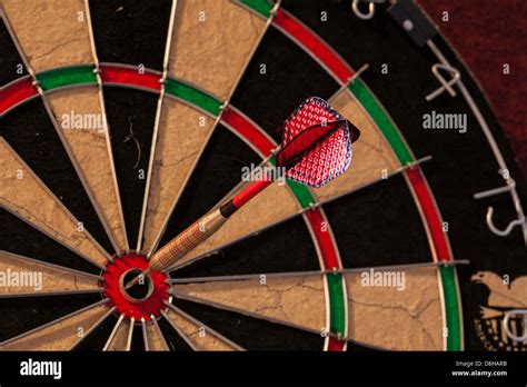 Thrown Dart In Bullseye Stock Photo Alamy