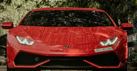 Red Lamborghini Huracan on Road · Free Stock Photo