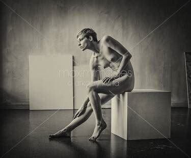 Photo Of Art Nude Portrait Of Woman Sitting Naked On A Posing Box In Artist Studio Black And