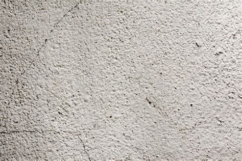 Rough Surface Of A Concrete Wall Painted In Greyish White Concrete