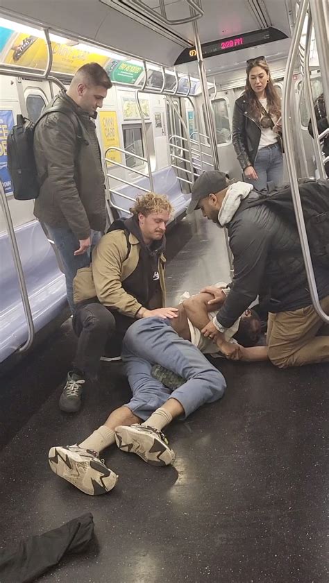 Shocking Video Shows NYC Subway Passenger Putting Unhinged Man In