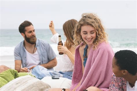 Premium Photo Group Of Friends Enjoying On Beach