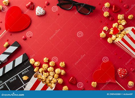 Top View Photo Of A Clapperboard D Glasses Popcorn Chocolates